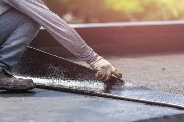 Professional Basement Waterproofing technician working in Canton, NC
